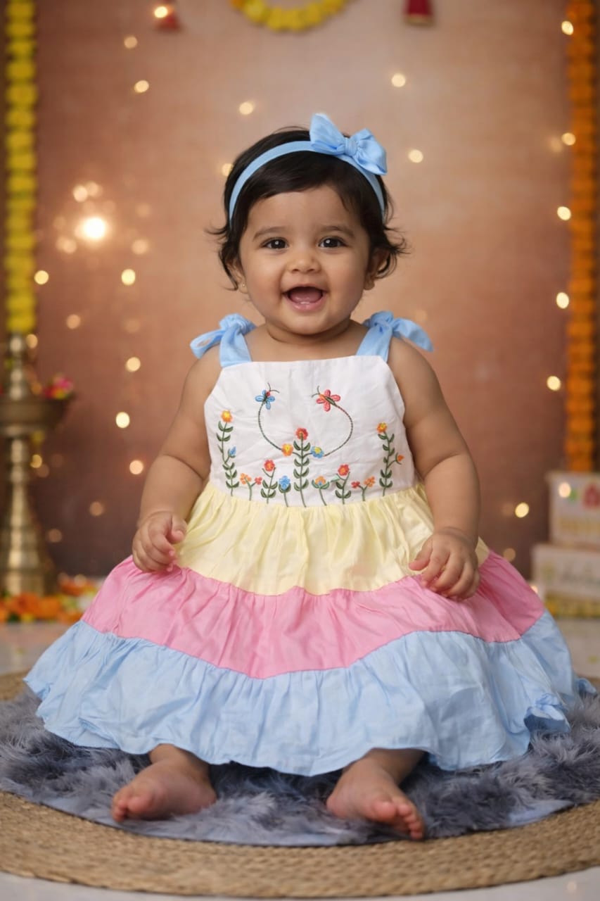 The rainbow ruffle celebration dress